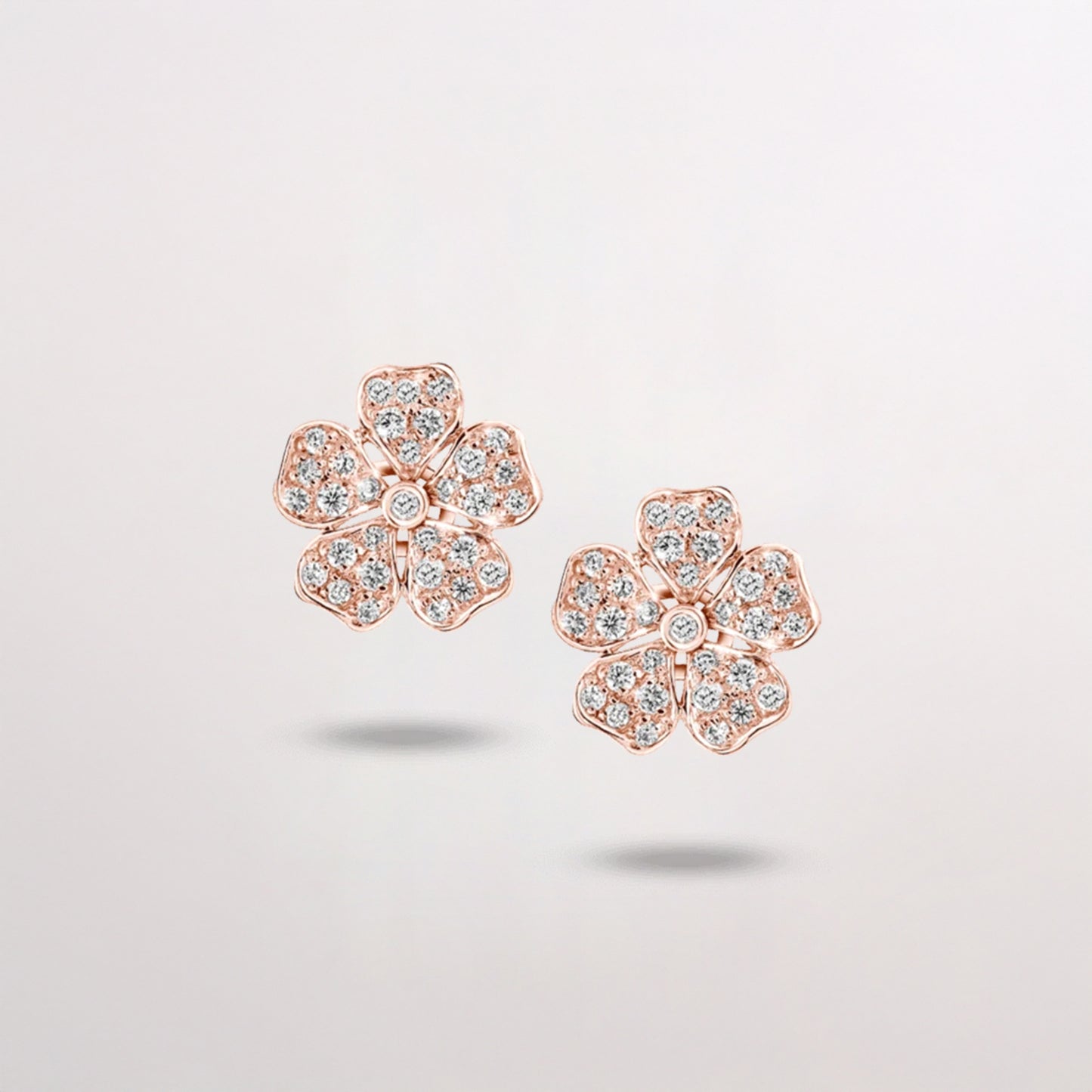 Diamond Flower Earrings in Rose Gold on white background