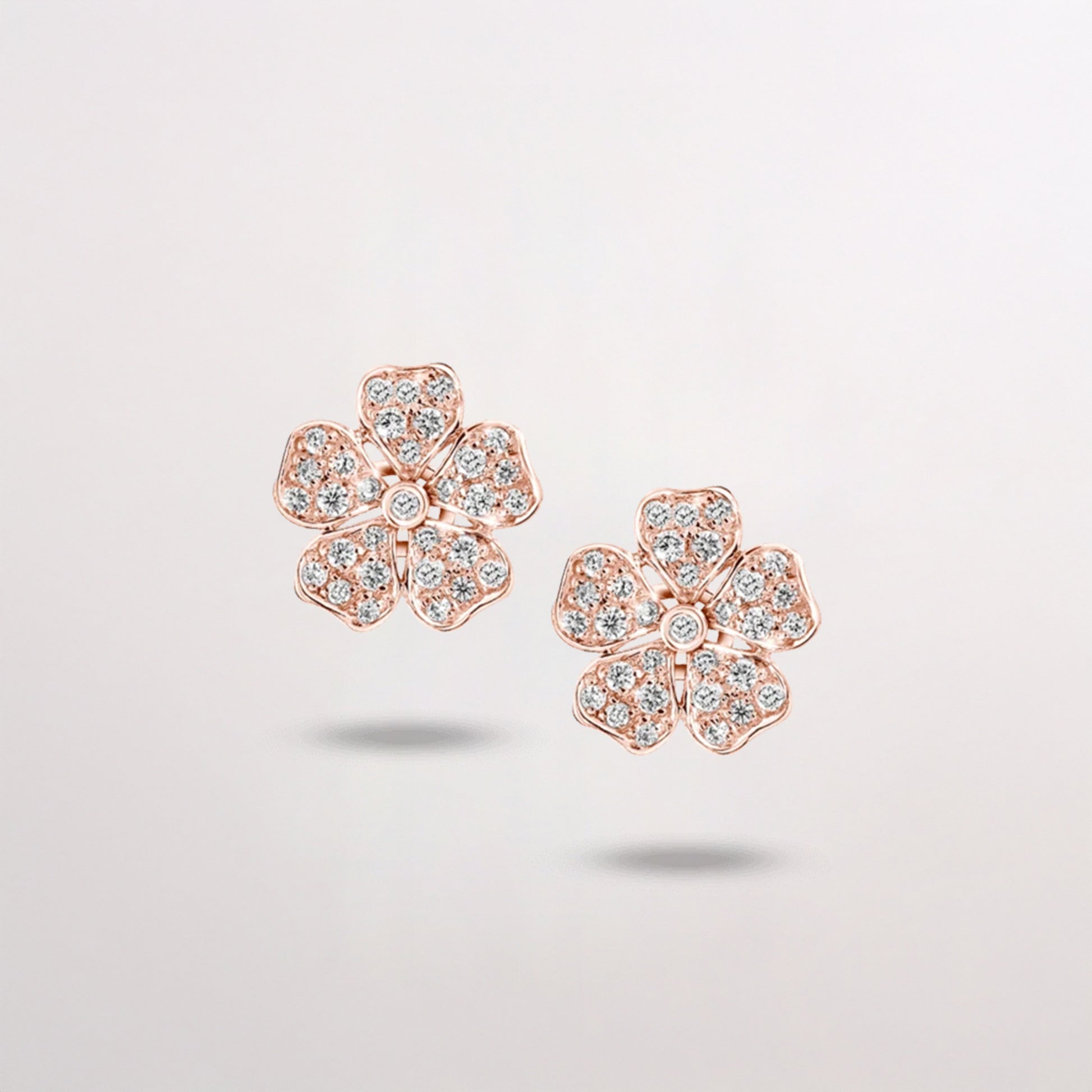 Diamond Flower Earrings in Rose Gold on white background