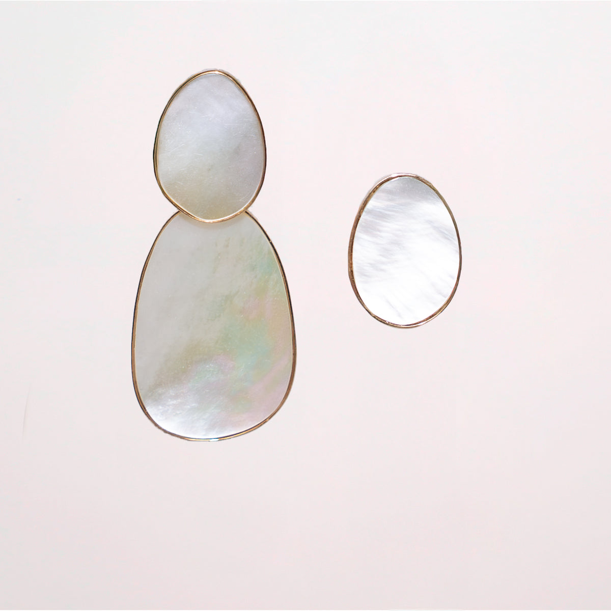 A pair of statement Mother of Pearl Earrings. Detachable stud dangle earrings set in 18k rose gold. 