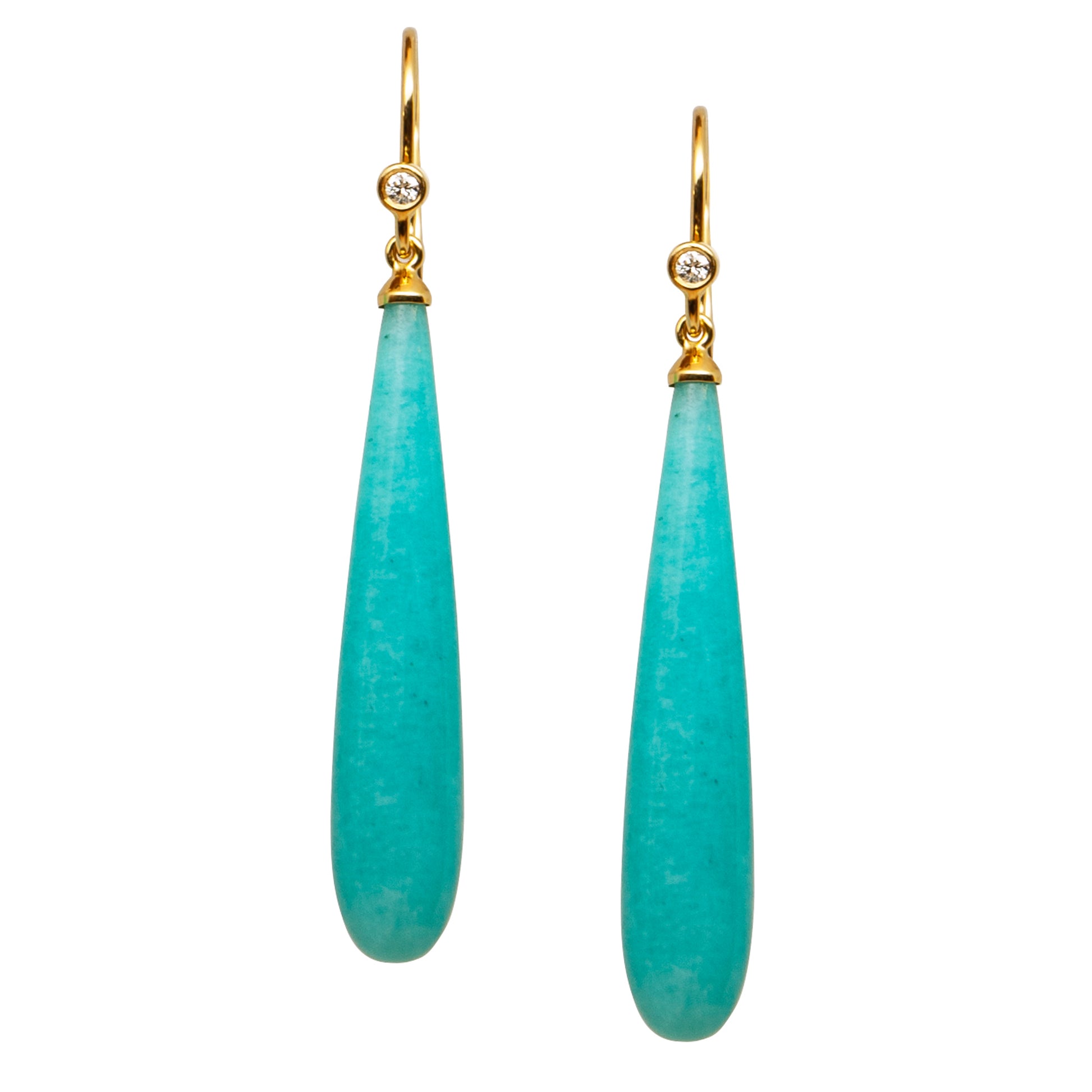 Pair of turquoise teardrop earrings with gold hooks and diamonds on a light background